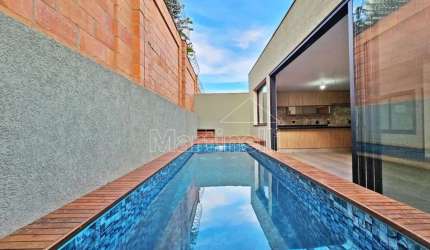 Casa térrea à venda no Condomínio Terras de Bonfim, próximo a Pacer Academia, Ribeirão Preto/SP.