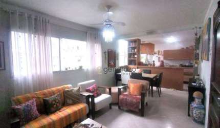 Apartamento á venda na praia das Pitangueiras, com 02 dormitórios e pequena vista para o mar.