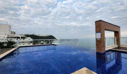 Apartamento a venda na praia do Tombo, 03 dormitórios, varanda gourmet, 03 vagas de garagem e lazer