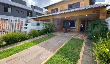 Sobrado 3 dormitórios no Centro de Xangri Lá