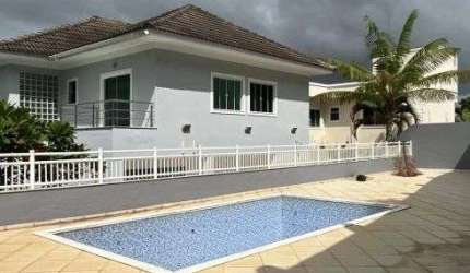 Casa de condomínio para venda possui 290 metros quadrados com 4 quartos em Lagoa - Macaé - RJ