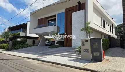 Casa em condomínio com 4 suítes a venda, 375m²
