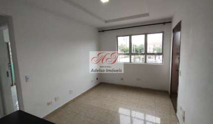 Apartamento de 2 quartos com suíte e vaga de garagem no Macuco, Santos-SP: seu novo lar espera por você!