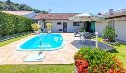 Casa com 3 dormitórios à venda, e uma suíte, 154 m² por R$ 1.050.000 - Velha Central - Blumenau/SC