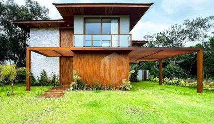 CASA A VENDA EM PRAIA DO FORTE, LITORAL NORTE DA BAHIA - Condomínio Praia Bella, acesso direto à praia, 7 suítes de alto padrão perto de tudo.