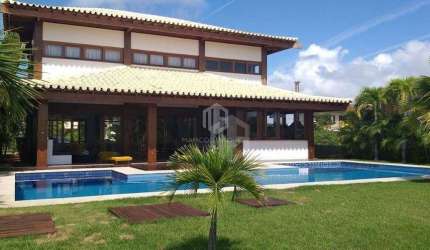 Casa de Luxo à Venda no Condomínio Acácias – Praia do Forte | 4 Suítes | Porteira Fechada | Piscina e Área Gourmet!