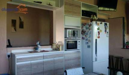 Casa à Venda em condomínio fechado no bairro Vila das Flores com 2 quartos e 73m²