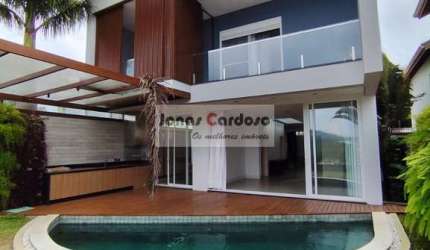Luxuosa casa à venda no condomínio Aruã em Mogi das Cruzes-SP, com 3 quartos, 3 suítes, 3 salas, 5 banheiros, 4 vagas, 370m².