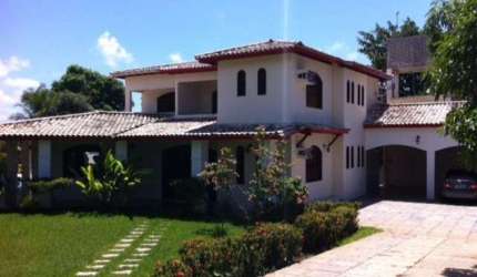 Casa em condomínio à venda em Vilas do Atlântico, Lauro de Freitas-BA: 5 suítes, 4 salas, 7 banheiros, 5 vagas e 600m² de área.