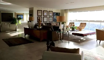 Apartamento de luxo no Rio Vermelho: 4 quartos, 4 suítes, 2 salas, 6 banheiros, 8 vagas de garagem. Confira!