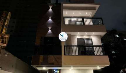 Sobrado triplex com piscina em condomínio para venda em Santos/SP