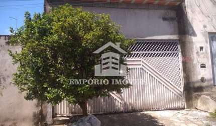 Vende-se uma casa .
