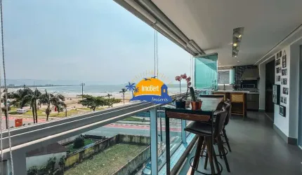 Apartamento à venda no Centro de Bertioga-SP: Frente ao mar-  3 quartos, 1 suíte, 2 salas, 2 banheiros, 2 vagas, 108m². Aproveite!