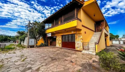 Casa de 3 dormitórios, 1 suíte, garagem fechada, churrasqueira, no bairro Cavalhada Porto Alegre/RS