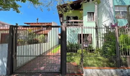 casa com 3 dormitórios, sendo 1 suíte, vaga para 4 carros, no bairro Santana