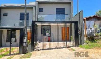 Casa Condominio em Porto Alegre, no bairro Tristeza, com 3 dormitório(s), e 3 banheiros, à venda.