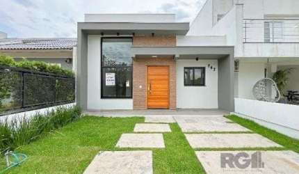 Casa em Porto Alegre, no bairro Hípica, com 3 dormitório(s), e 3 banheiros, à venda.