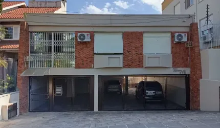 Apartamento térreo com 3 dormitórios e 2 vagas no Bairro Cristo Redentor