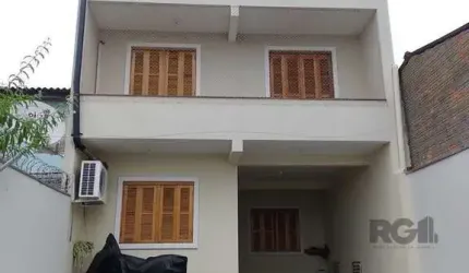 Casa com 3 quartos, 4 vagas de garagem, salão de festa, sacada 198m² no bairro Rubem Berta, Porto Alegre/RS