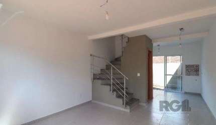Casa Condominio em Porto Alegre, no bairro Vila Nova, com 2 dormitório(s), e 2 banheiros, à venda.