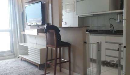 APARTAMENTO DE 2 DORMITÓRIOS E VAGA ESCRITURADA EM CONDOMÍNIO COM INFRA COMPLETA.
