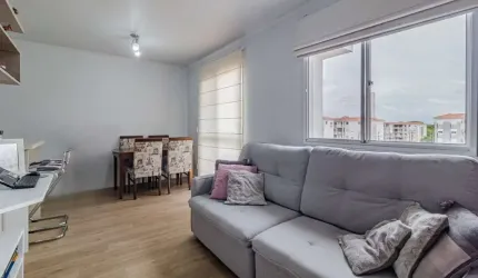 Apartamento com 2 dormitórios e 1 vaga de garagem escriturada no Bairro Humaitá