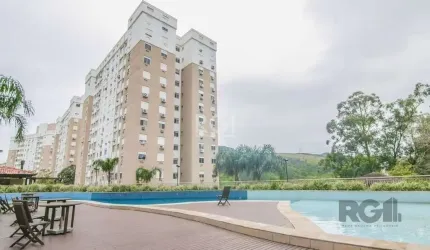 Apartamento de três dormitórios, suíte e uma vaga de garagem no bairro Jardim Carvalho em Porto Alegre.