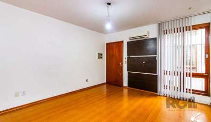 Apartamento com 2 dormitórios e 1 vaga de garagem escriturada no bairro Rio Branco