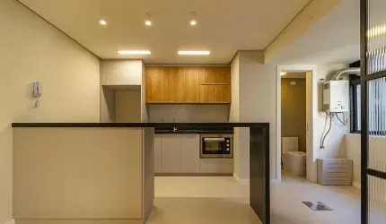 Apartamento a venda no bairro Auxliadora dois dormitórios, totalmente reformado.