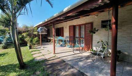 Casa com 2 dormitórios, sendo 1 suíte,  à venda por R$ 160.000 - Centro - Balneário Pinhal/RS