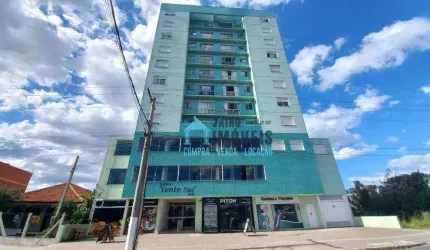 Apartamento com 3 dormitórios à venda por R$ 550.000 - Centro - Tramandaí/RS