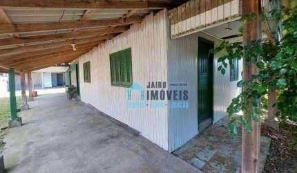 Terreno com 2 casas, uma em alvenaria e uma em madeira, à venda por R$ 110.000 - Balneario Pinhal - Balneário Pinhal/RS