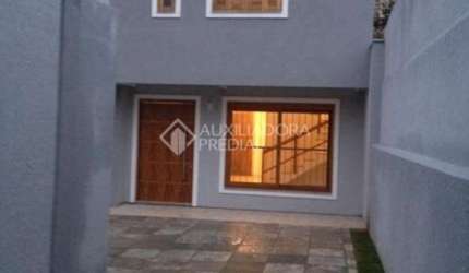 Casa em condomínio fechado com 3 quartos à venda na Avenida Alberto Pasqualini, 494, Jardim Itu Sabará, Porto Alegre, 94 m2 por R$ 470.000