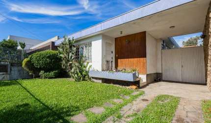 Casa com 3 quartos à venda na Rua Coronel Armando Assis, 134, Três Figueiras, Porto Alegre, 180 m2 por R$ 1.299.000