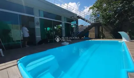 Casa com 4 quartos à venda na Rua Sagrada Familia, 183, Pinheira, Palhoça, 183 m2 por R$ 1.700.000