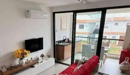 Apartamento com 2 dormitórios à venda, 65 m² por R$ 700.000 - Buraquinho - Lauro de Freitas/BA