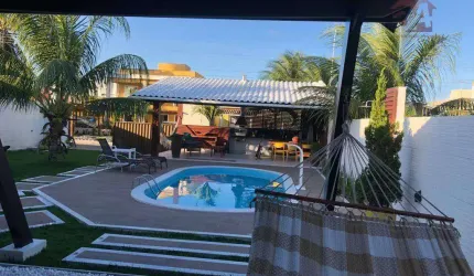 Casa com 3 dormitórios à venda por R$ 970.000 - Barra do Jacuípe - Camaçari/BA