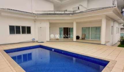 Casa em condomínio fechado com 4 quartos à venda no Cacupé, Florianópolis  por R$ 3.700.000