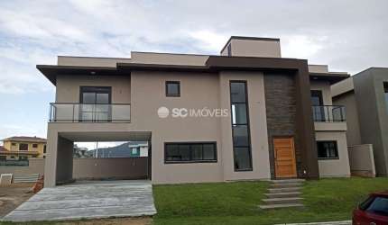 Casa em condomínio fechado com 4 quartos à venda no São João do Rio Vermelho, Florianópolis  por R$ 1.750.000