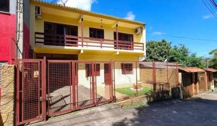 Casa 4 dormitórios à venda Vila Nova Porto Alegre/RS