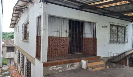 Casa 3 dormitórios à venda Cavalhada Porto Alegre/RS