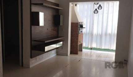 Vende-se apartamento 2 dorm com vaga, sacada com churrasqueira - 64m² - Partenon