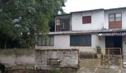 Casa 5 dormitórios, bairro Camaquã.