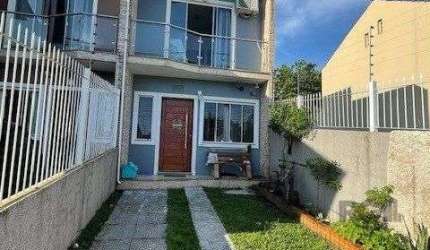 Casa 2 dormitórios à venda Guarujá Porto Alegre/RS