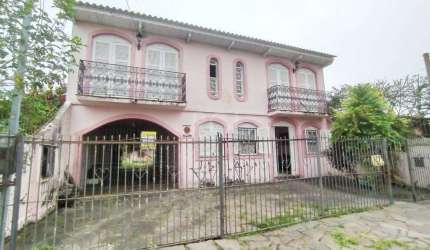 Casa 3 dormitórios à venda Guarujá Porto Alegre/RS