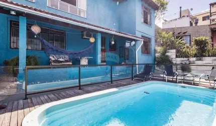 Casa à venda com 4 dormitórios, 1 suíte master no bairro Partenon