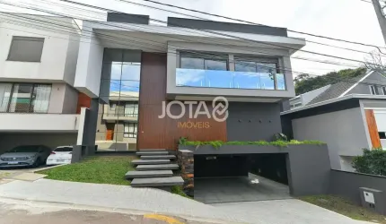 Linda casa em condomínio no Campo Comprido - J8