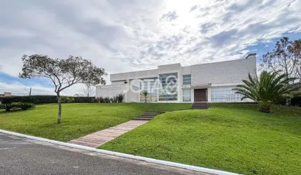 Casa em condomínio 4 suites e salas integradas J8