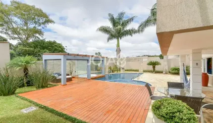 Casa com 4 suítes e 800m² de terreno - J8