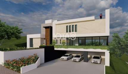 Casa em condomínio com 4 suítes e piscina - J8
